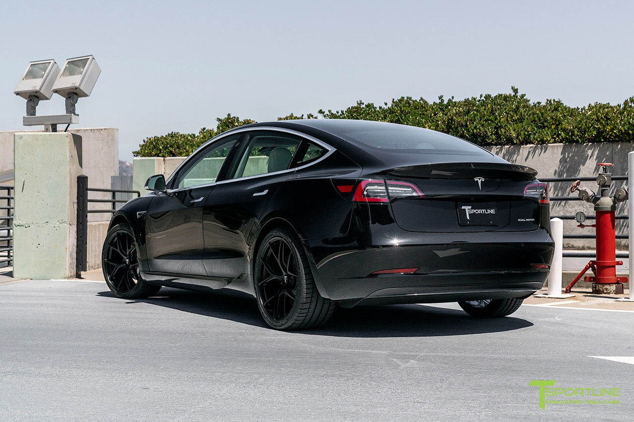Black Performance Tesla Model 3 with Carbon Fiber Tesla Model 3 Front Apron (Front Splitter or Front Lip), Rear Diffuser, Side Skirt, and Rear Trunk Wing by T Sportline