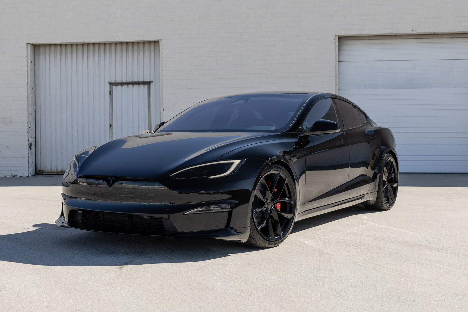 Black Tesla Model S Plaid with Bentley Red Interior and Painted Sport Package