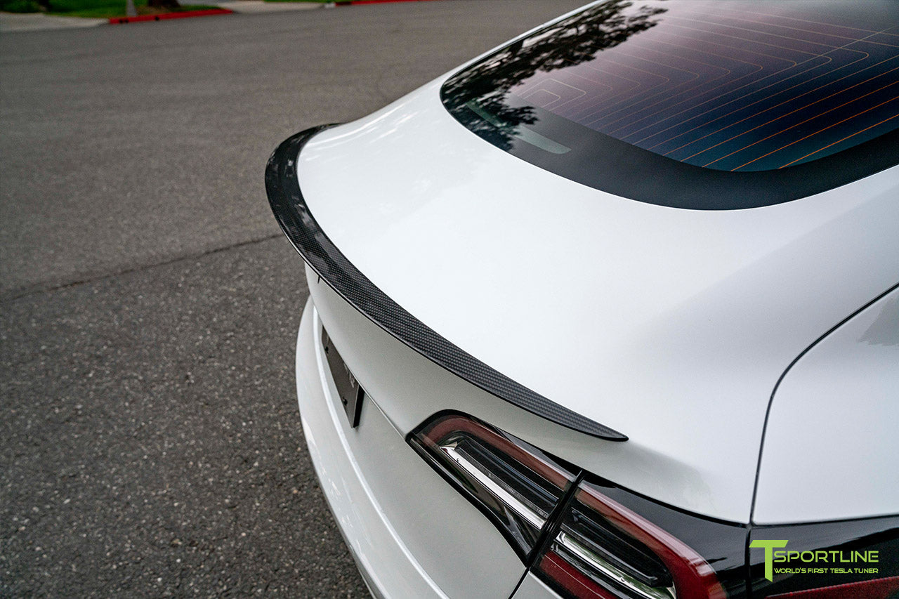 Pearl White Tesla Model 3 with Matte Carbon Fiber Executive Performance Lip Spoiler Trunk Wing by T Sportline