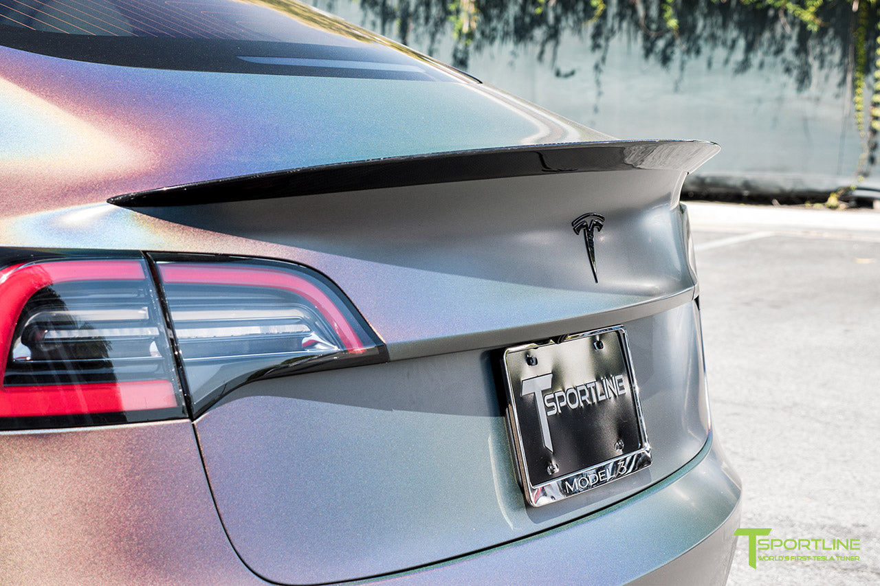 Satin Psychedelic Wrapped Black Performance Model 3 with Gloss Carbon Fiber Trunk Wing Executive Performance Lip Spoiler by T Sportline