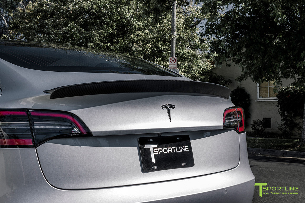 Silver Tesla Model 3 with Matte Carbon Fiber Trunk Wing Spoiler by T Sportline