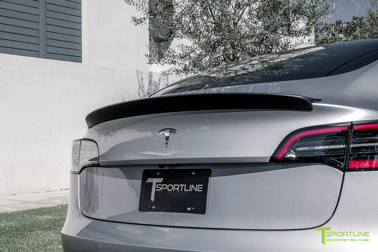 Silver Tesla Model 3 with Matte Carbon Fiber Trunk Wing Spoiler by T Sportline