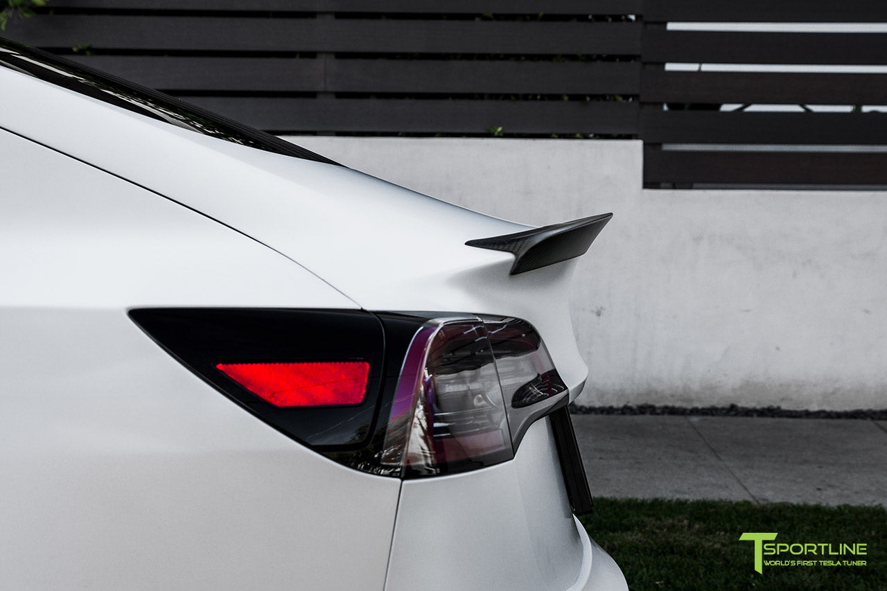 Xpel Stealth Paint Protection Film Pearl White Tesla Model 3 with Matte Carbon Fiber Trunk Wing and Matte Black 20 inch TST Turbine Style Wheels by T Sportline