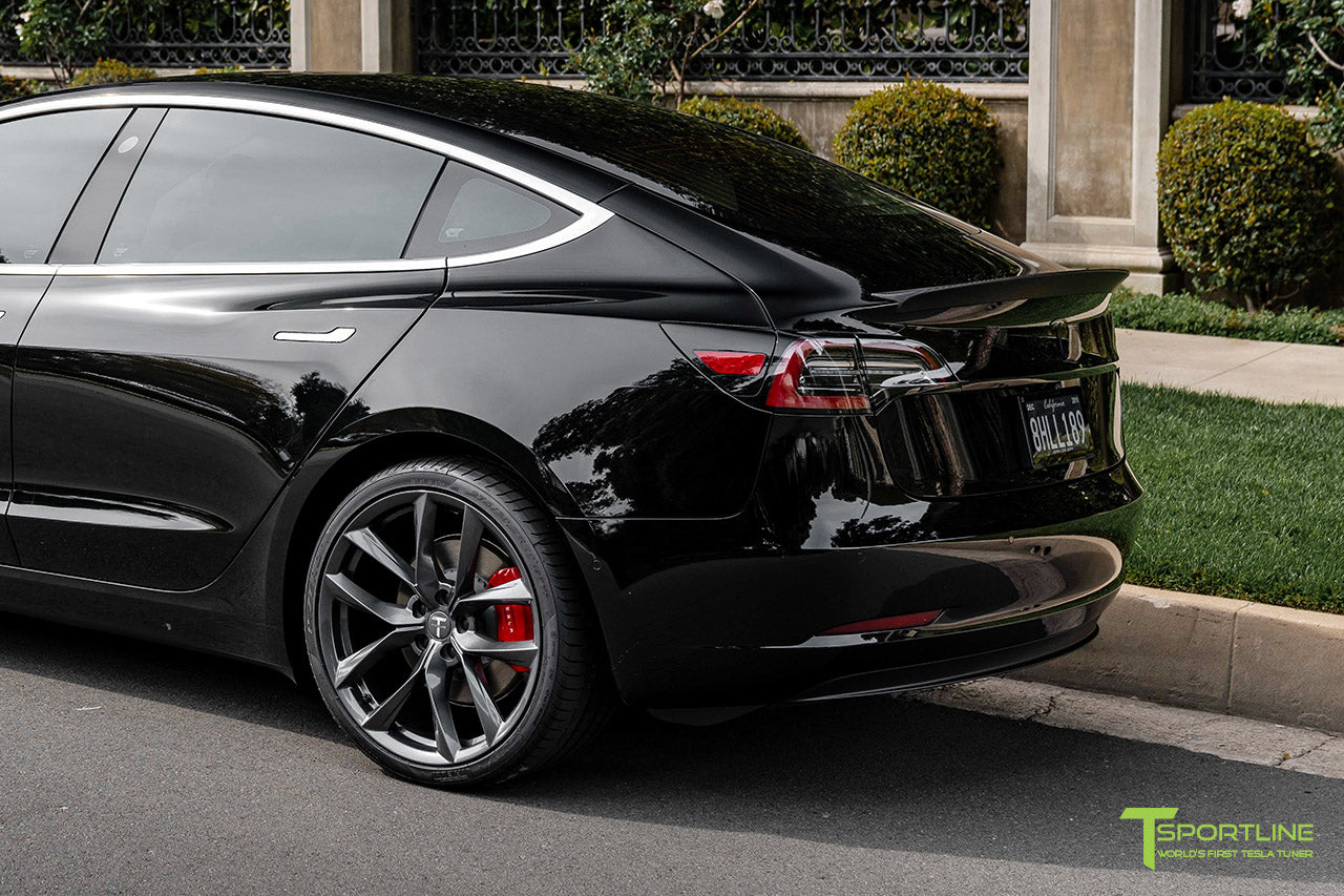Black Tesla Model 3 Performance with Performance Package and Matte Carbon Fiber Trunk Wing Spoiler by T Sportline