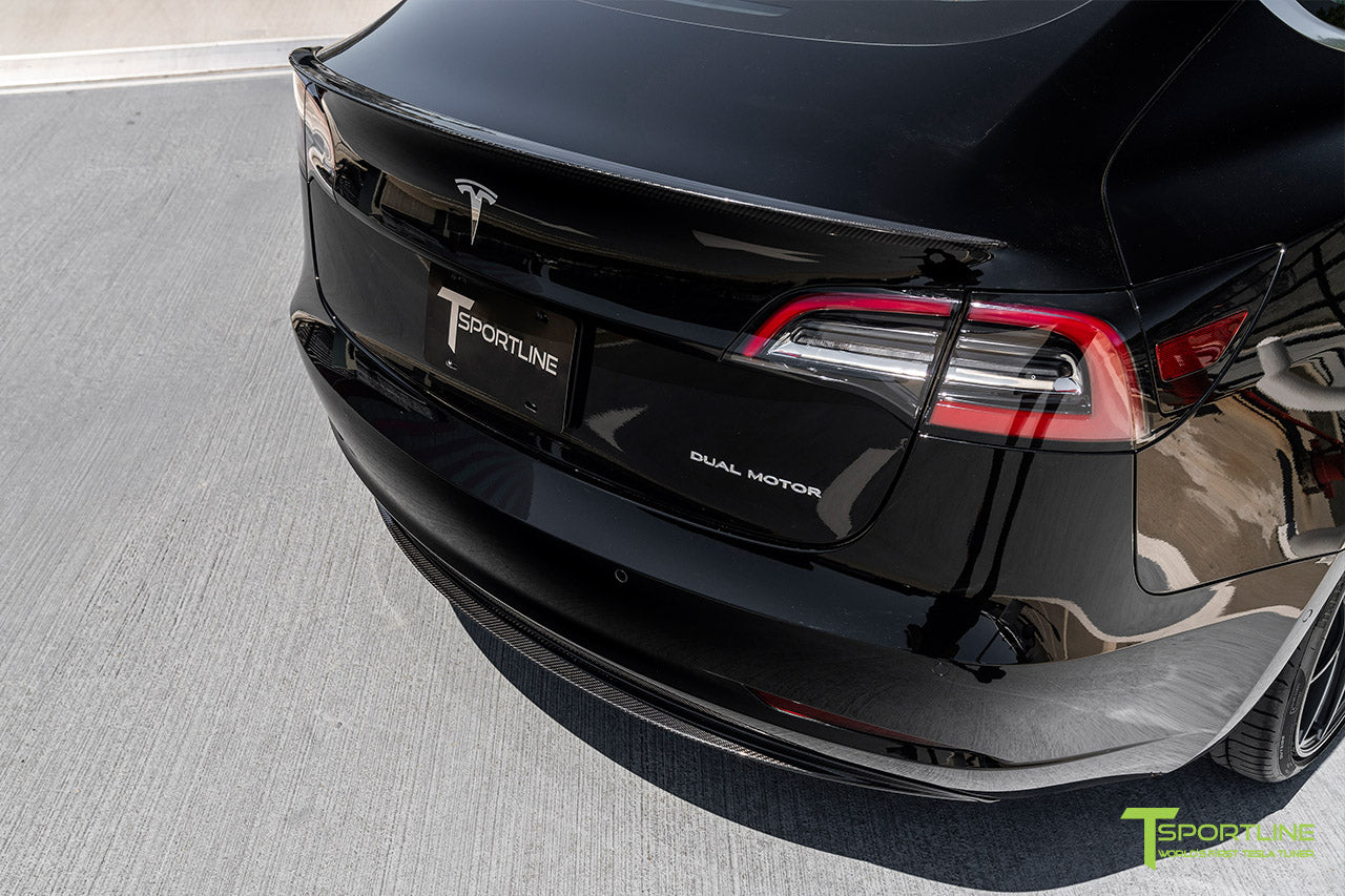 Black Performance Tesla Model 3 with Carbon Fiber Tesla Model 3 Front Apron (Front Splitter or Front Lip), Rear Diffuser, Side Skirt, and Rear Trunk Wing by T Sportline 