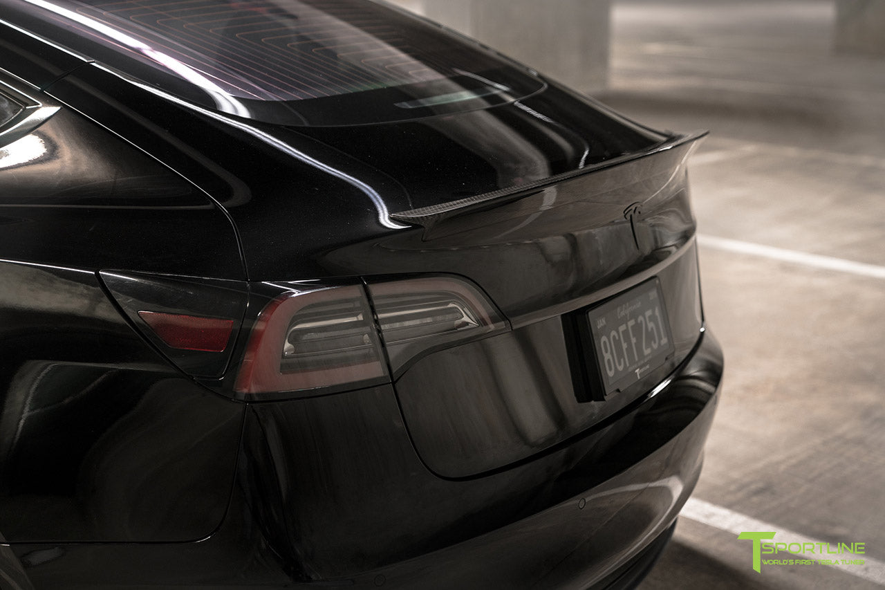 Black Tesla Model 3 with Gloss Carbon Fiber Trunk Wing Spoiler by T Sportline 