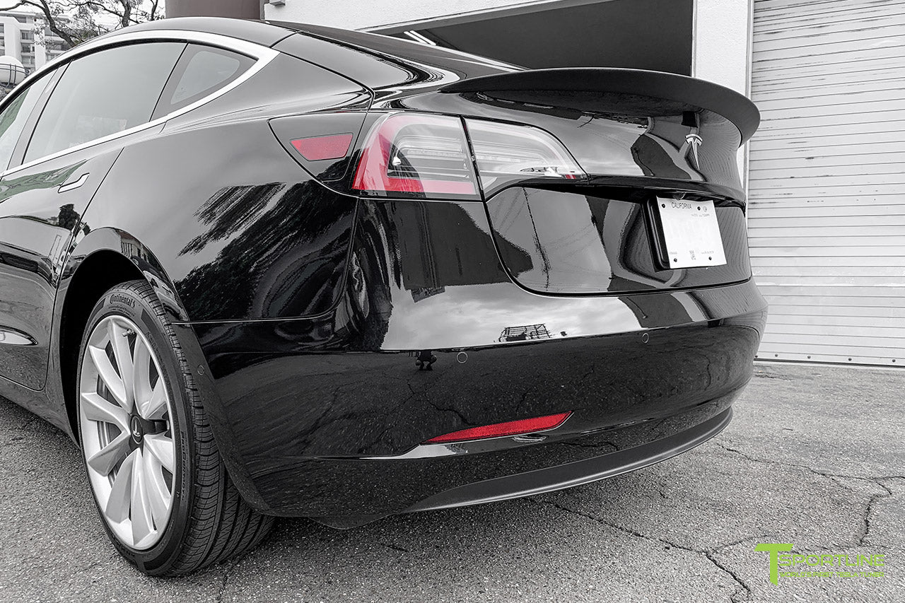 Black Model 3 with Matte Carbon Fiber Trunk Wing Executive Performance Lip Spoiler by T Sportline 