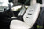 White Leather Seat Upgrade - Black Suede Insignia - Matte Carbon Fiber Trim