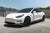 Pearl White Tesla Model 3 with Carbon Fiber Front Apron (Lip/Splitter), Side Skirts, Rear Diffuser, Executive Trunk Wing Lip Spoiler by T Sportline