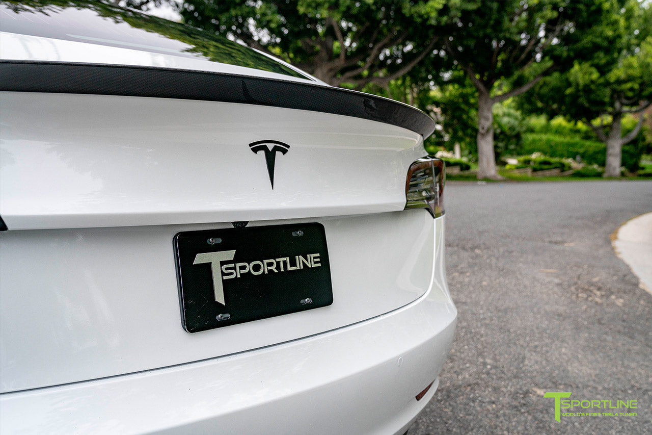 Pearl White Tesla Model 3 with Matte Carbon Fiber Executive Performance Lip Spoiler Trunk Wing by T Sportline