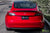 Red Multi-Coat Tesla Model 3 with Matte Carbon Fiber Trunk Wing Spoiler by T Sportline 