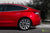 Red Multi-Coat Tesla Model 3 with Matte Carbon Fiber Trunk Wing Spoiler by T Sportline 