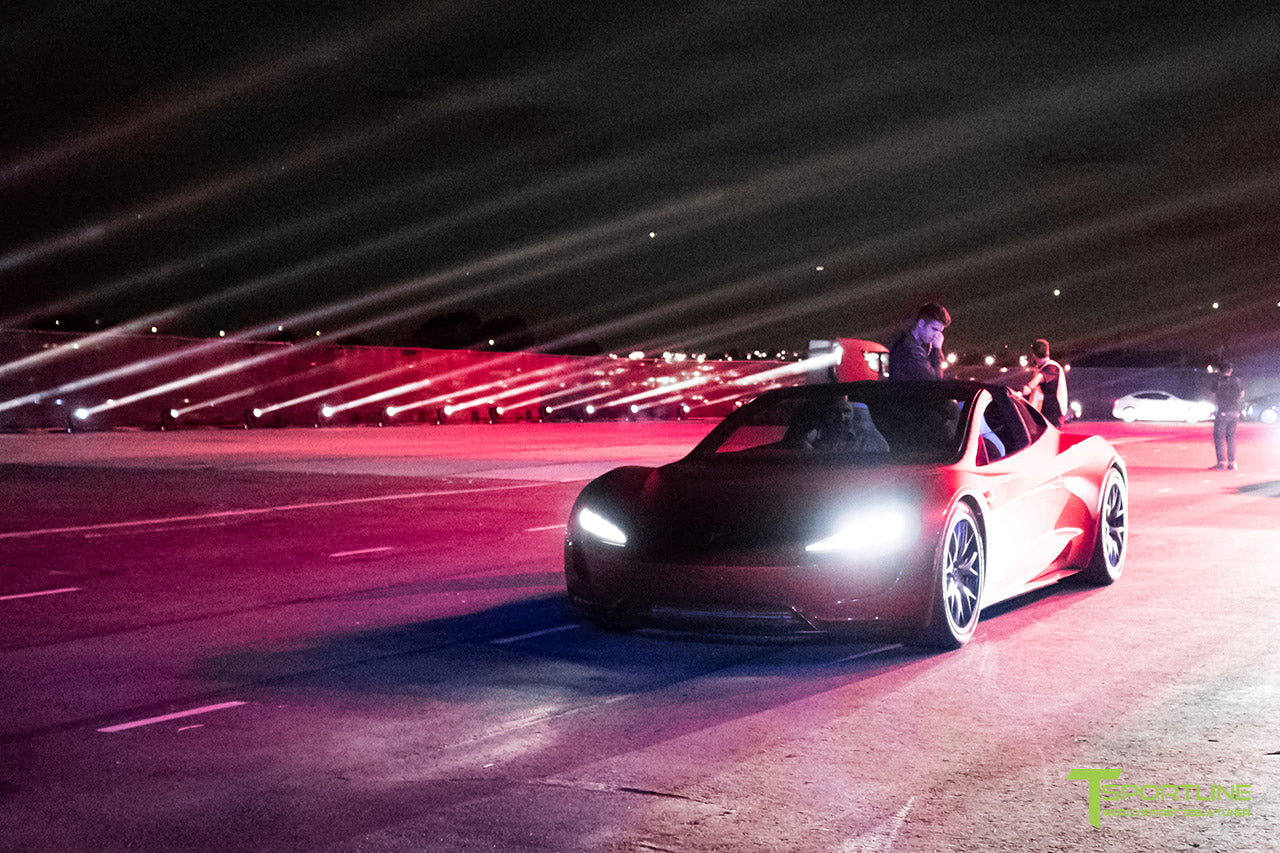 Reveal-era Tesla Roadster display Red Tesla Roadster displayed at an unveiling event in 2017