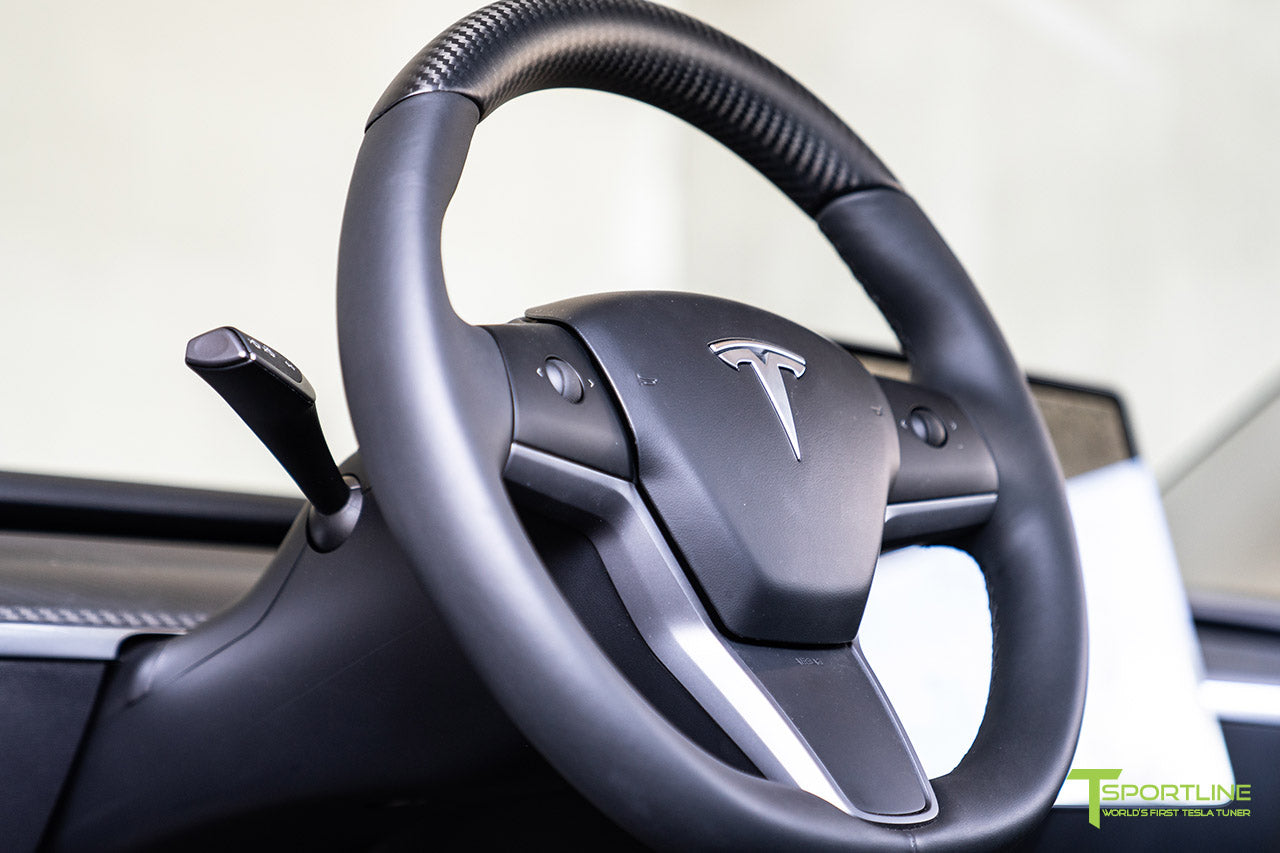 Tesla Model 3 with Matte Carbon Fiber Steering Wheel and Dash Panel Dashboard Cover by T Sportline 