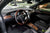Tesla Model X with Figured Ash Wood Steering Wheel and Center Console Flip Door in Black Interior by T Sportline 
