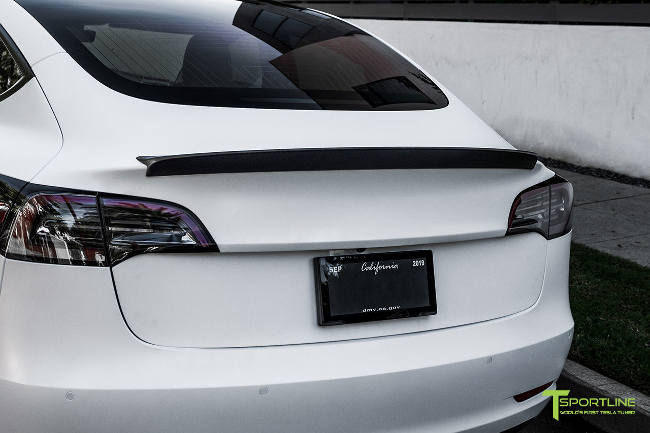 Xpel Stealth Paint Protection Film Pearl White Tesla Model 3 with Matte Carbon Fiber Trunk Wing and Matte Black 20 inch TST Turbine Style Wheels by T Sportline